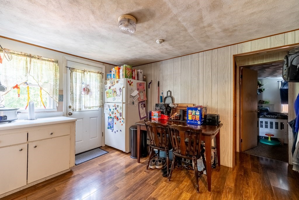 102 Mendon Street Blackstone, MA 01504 - Photo 24 of 41 a view of a kitchen and dining room