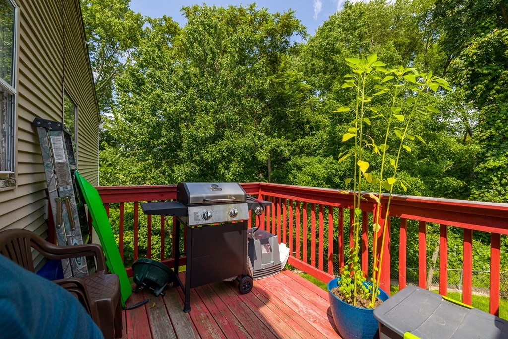102 Mendon Street Blackstone, MA 01504 - Photo 26 of 41 a view of a balcony with wooden floor