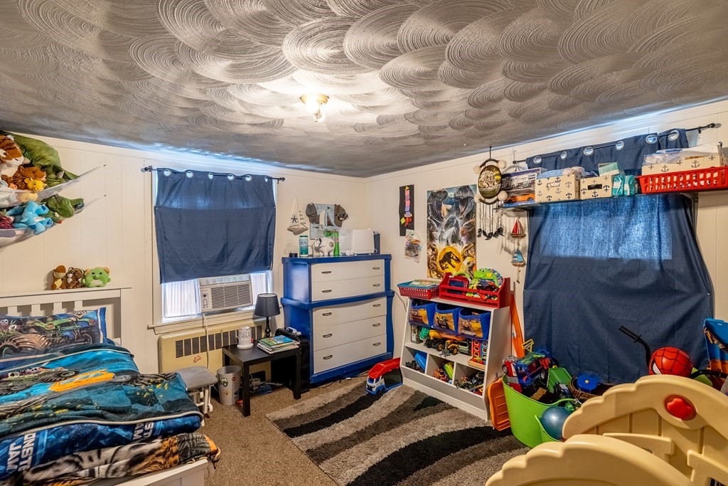 102 Mendon Street Blackstone, MA 01504 - Photo 28 of 41 a children room with toys and toys