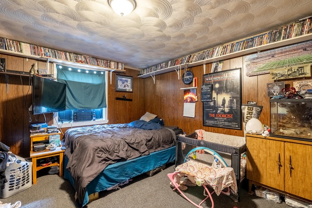 102 Mendon Street Blackstone, MA 01504 - Photo 37 of 41 a bedroom with bed and a window