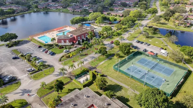an aerial view of a house with a lake view
