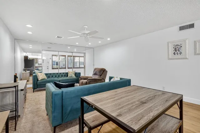 a view of a dining room with furniture