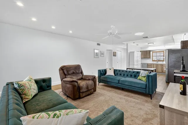 a living room with furniture and a couch