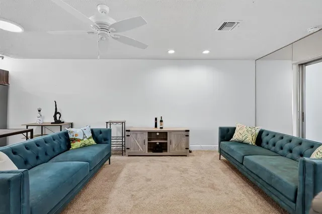 a living room with furniture and a couch