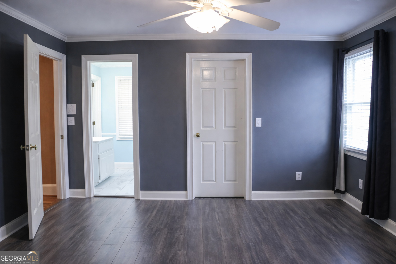 418 Flora Ext Avenue Rome, GA 30161 - Photo 18 of 29 an empty room with wooden floor and windows