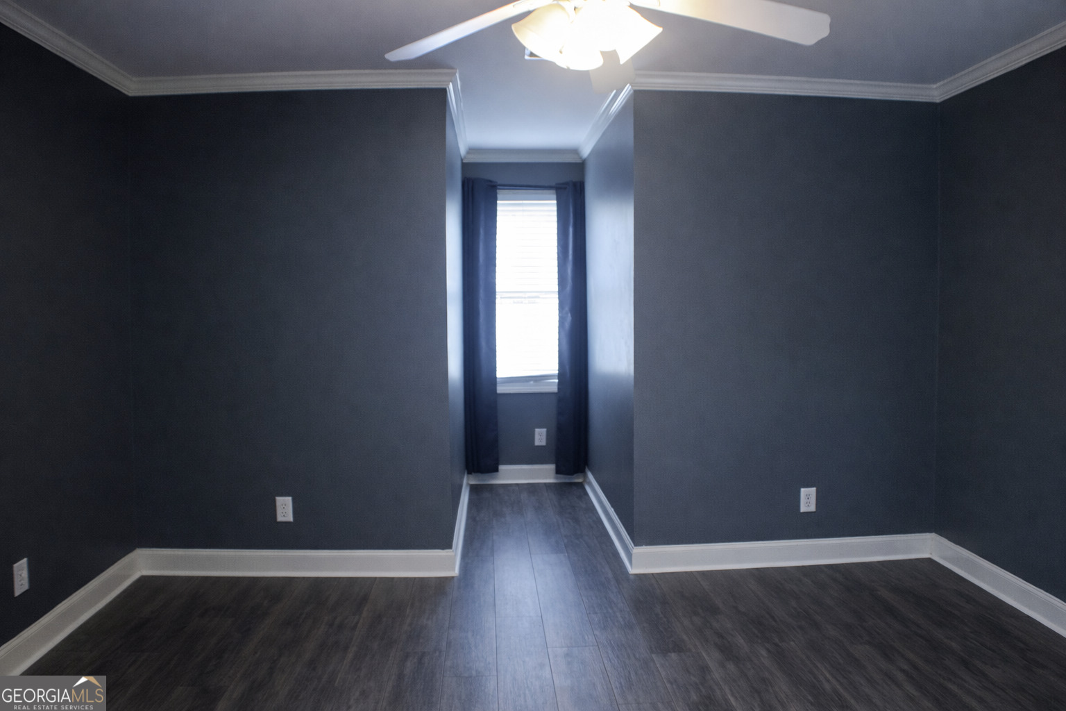 418 Flora Ext Avenue Rome, GA 30161 - Photo 27 of 35 an empty room with wooden floor and windows