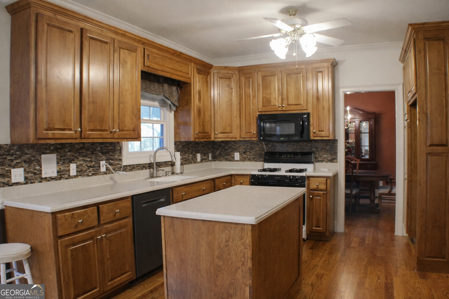 418 Flora Ext Avenue Rome, GA 30161 - Photo 8 of 29 a kitchen with a sink stove and refrigerator
