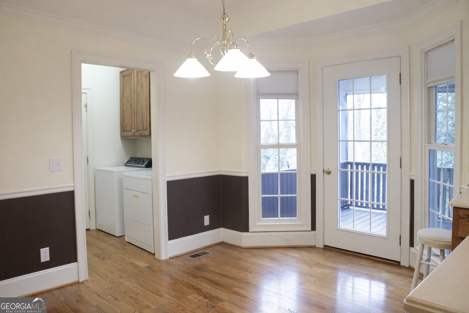 418 Flora Ext Avenue Rome, GA 30161 - Photo 10 of 29 a view of an empty room with wooden floor and a window