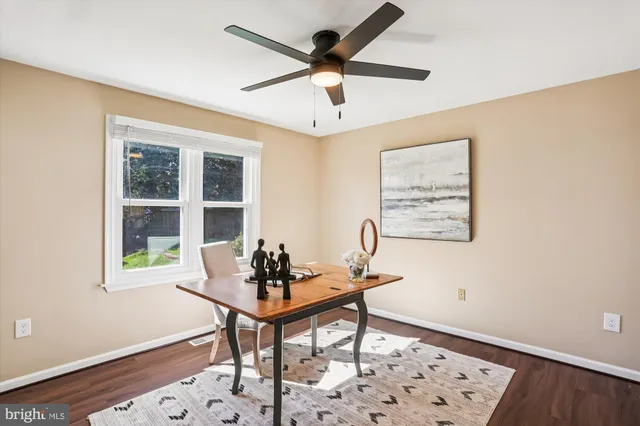 a bathroom with a shower and a glass door