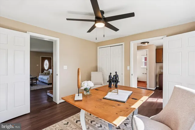 a work room with furniture and window