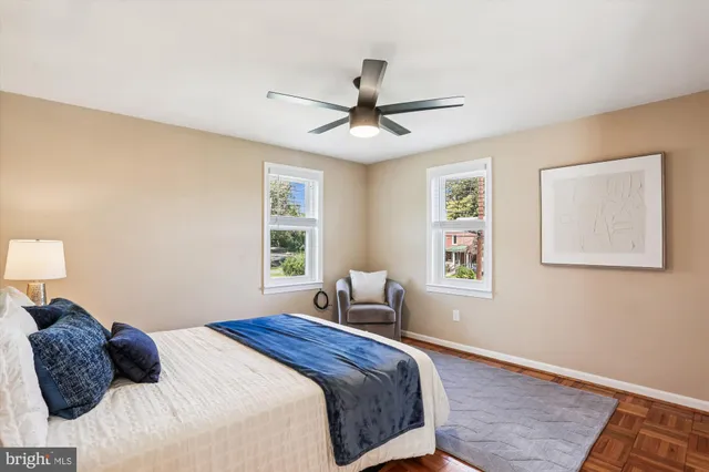 a bathroom with a shower and a glass door