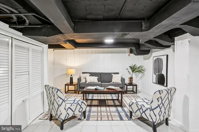 a view of a hallway with wooden floor and closet
