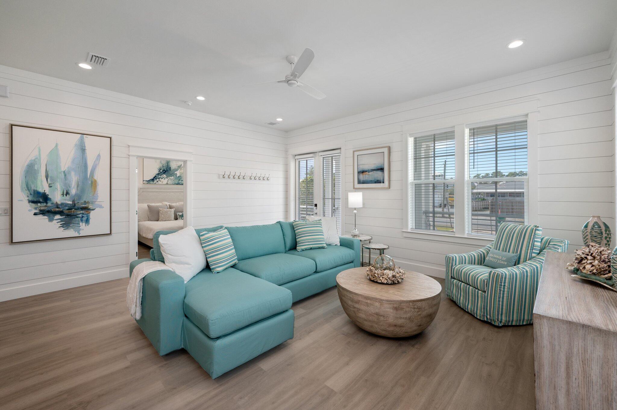 36 North Gulf Drive Santa Rosa Beach, FL 32459 - Photo 11 of 96 a living room with furniture and a wooden floor