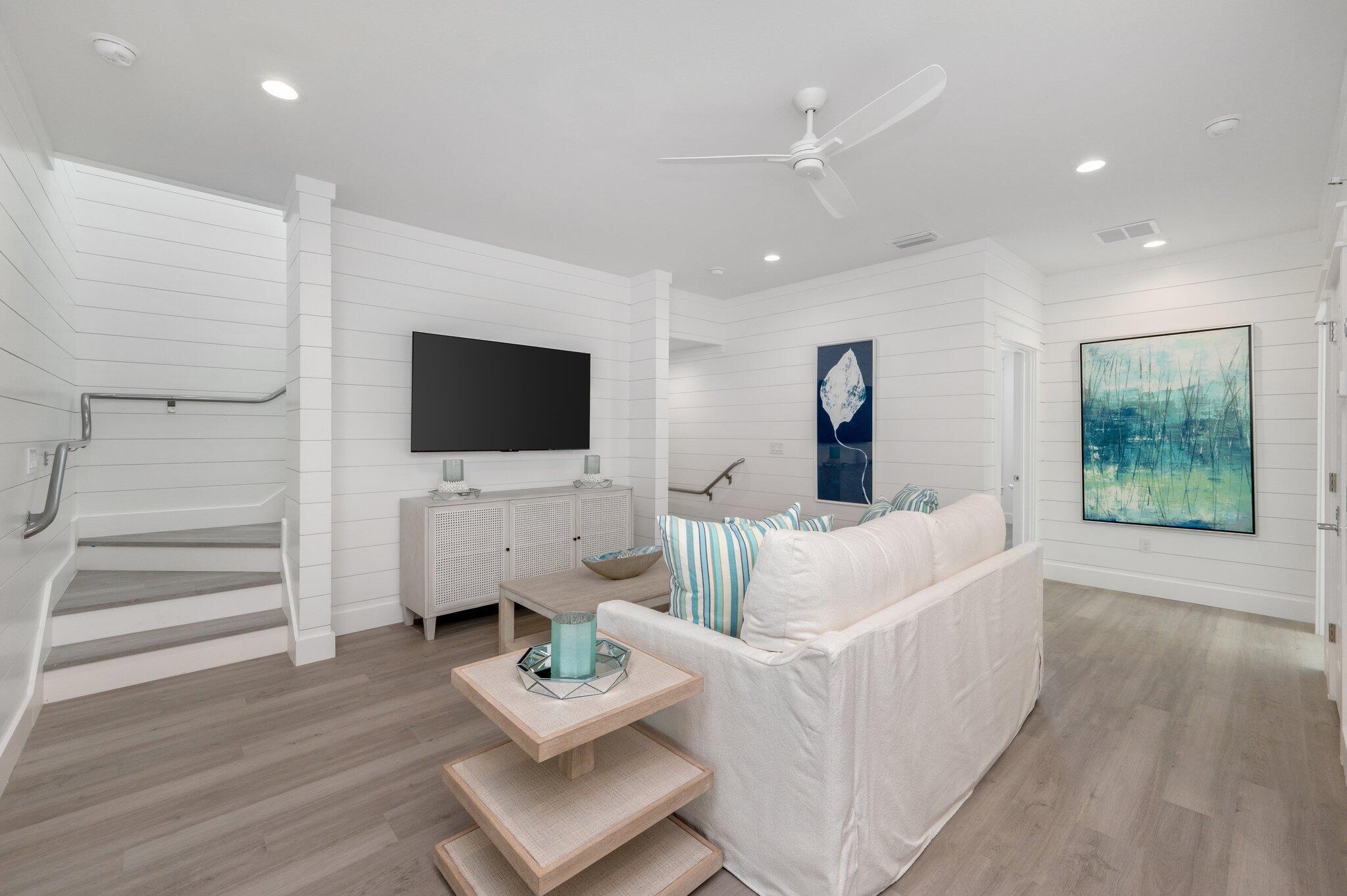 36 North Gulf Drive Santa Rosa Beach, FL 32459 - Photo 40 of 96 a living room with furniture and a flat screen tv