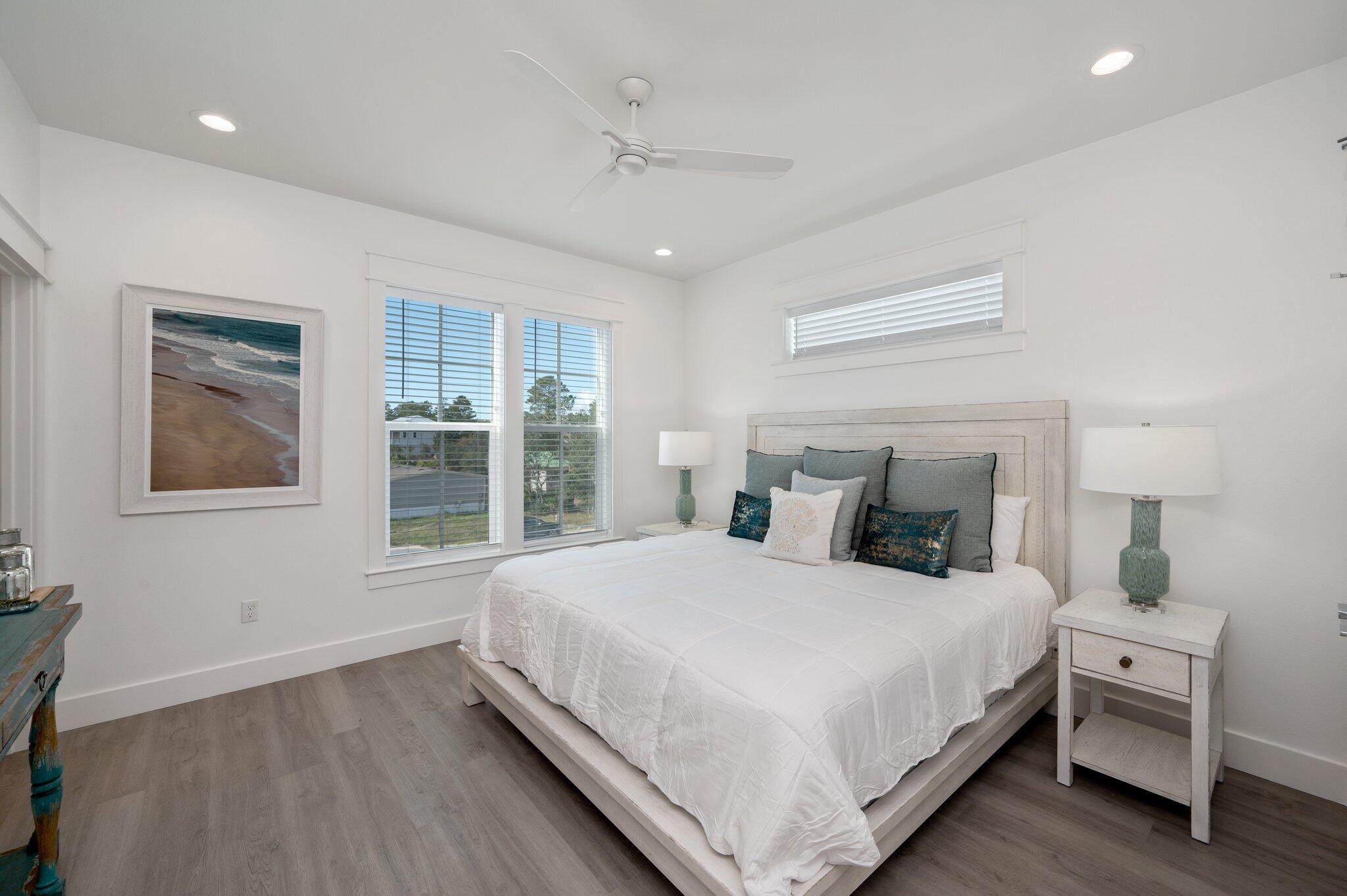 36 North Gulf Drive Santa Rosa Beach, FL 32459 - Photo 48 of 96 a bedroom with a large bed and a window