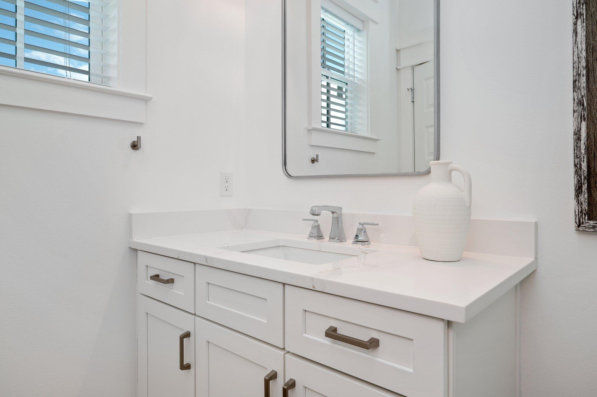 36 North Gulf Drive Santa Rosa Beach, FL 32459 - Photo 65 of 96 a bathroom with a sink and a mirror