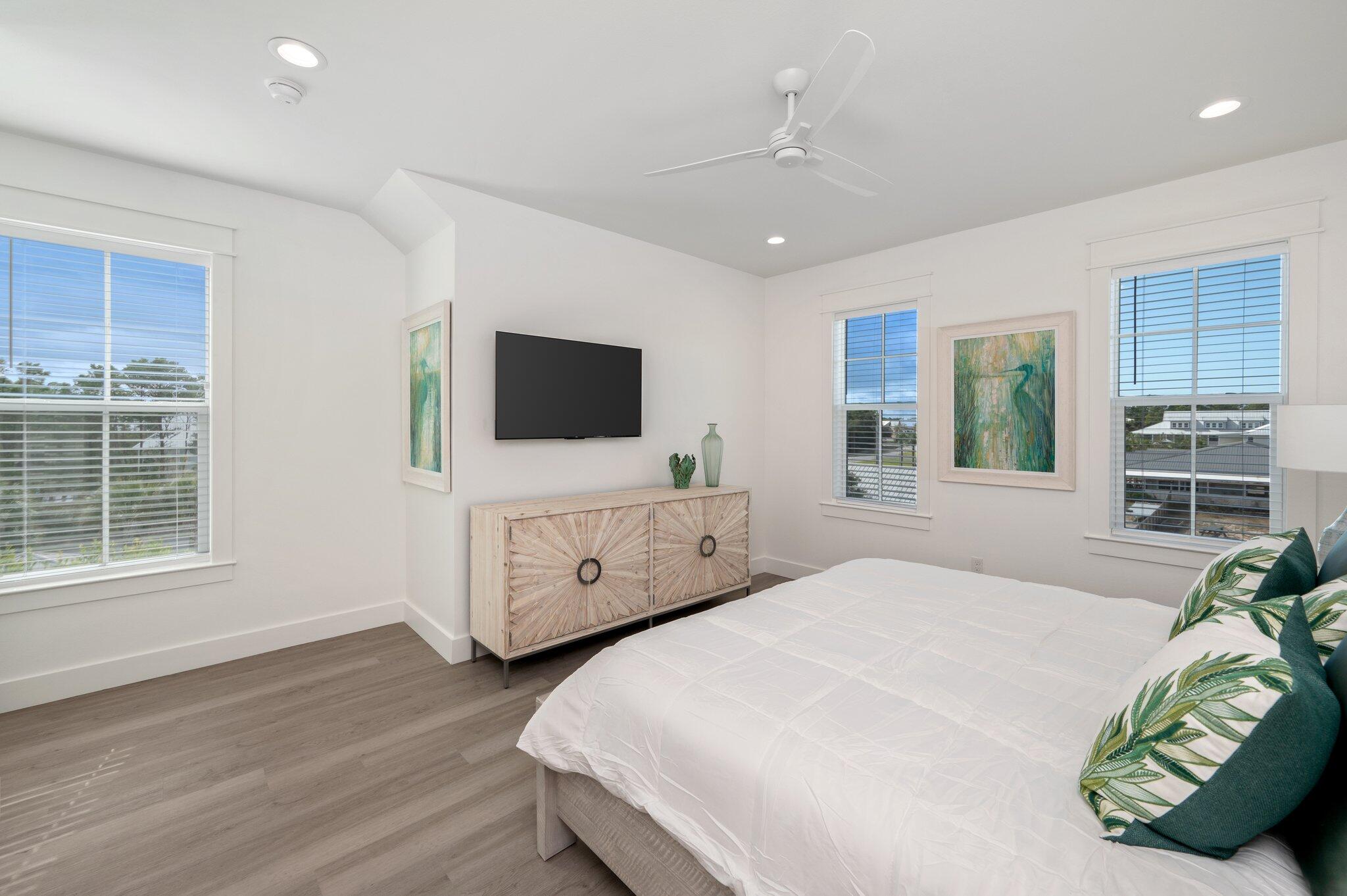 36 North Gulf Drive Santa Rosa Beach, FL 32459 - Photo 74 of 96 a bedroom with a bed and a flat screen tv