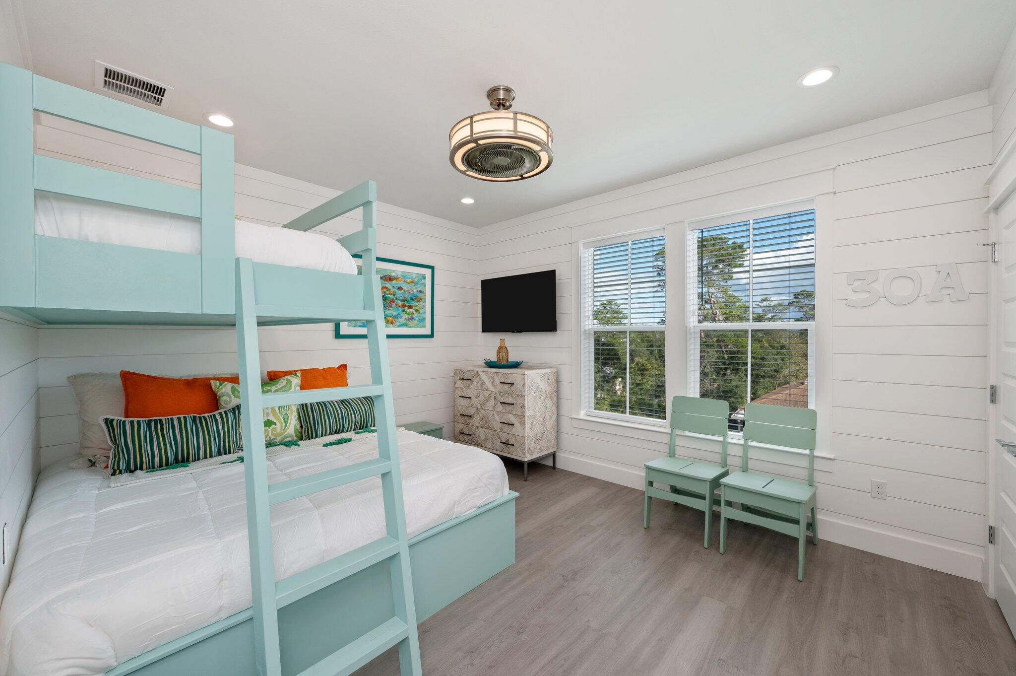 36 North Gulf Drive Santa Rosa Beach, FL 32459 - Photo 79 of 96 a bedroom with furniture and a flat screen tv