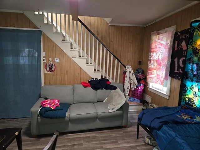 a living room with furniture and a couch