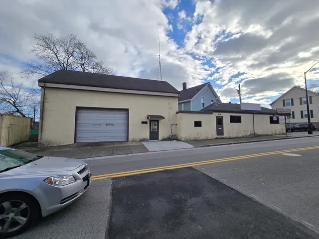 a view of a car in front of a house