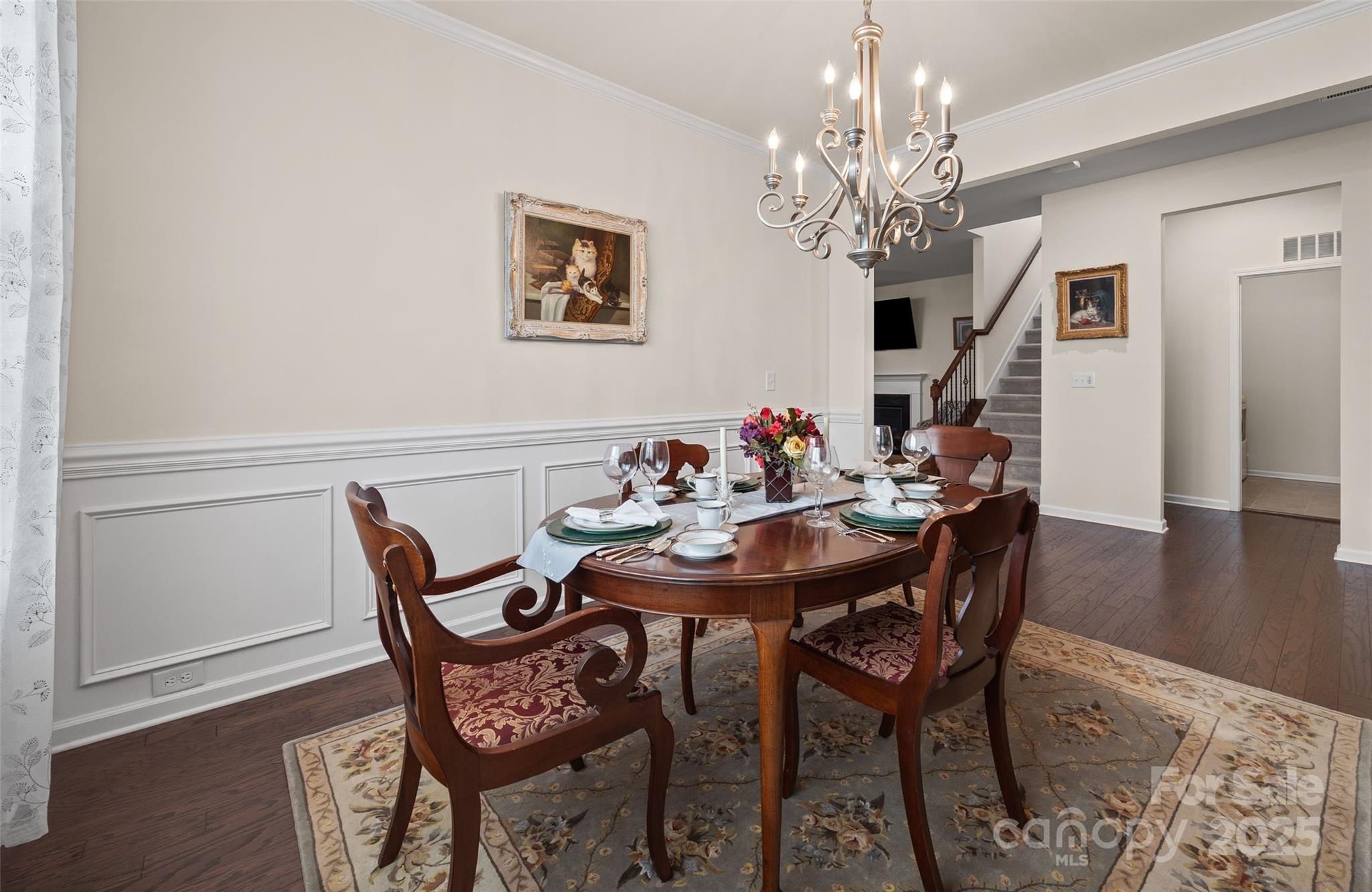 1609 Tranquility Boulevard Lancaster, SC 29720 - Photo 12 of 29 a view of a dining room with furniture and wooden floor