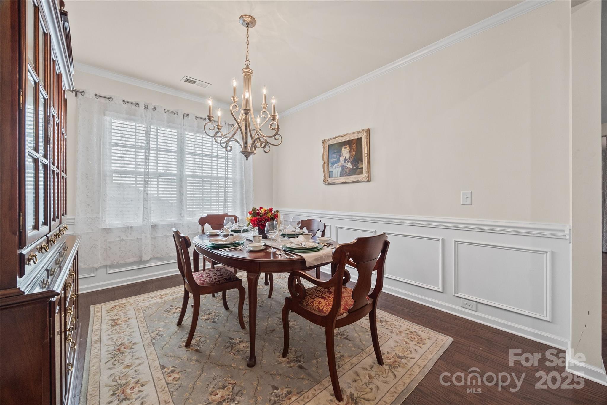 1609 Tranquility Boulevard Lancaster, SC 29720 - Photo 13 of 29 a view of a dining room with furniture and chandelier