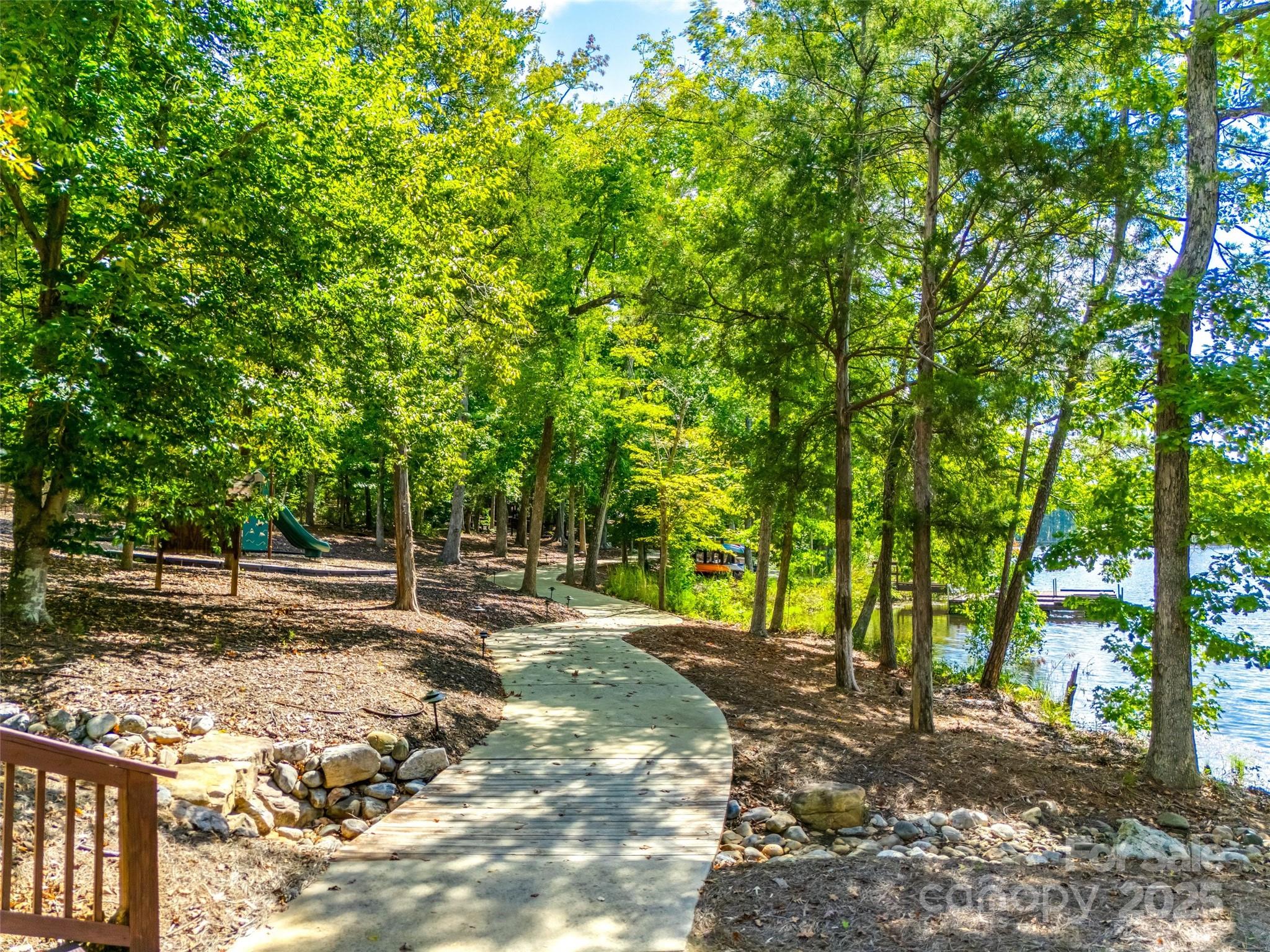 1609 Tranquility Boulevard Lancaster, SC 29720 - Photo 28 of 29 a view of a tree in the middle of a yard