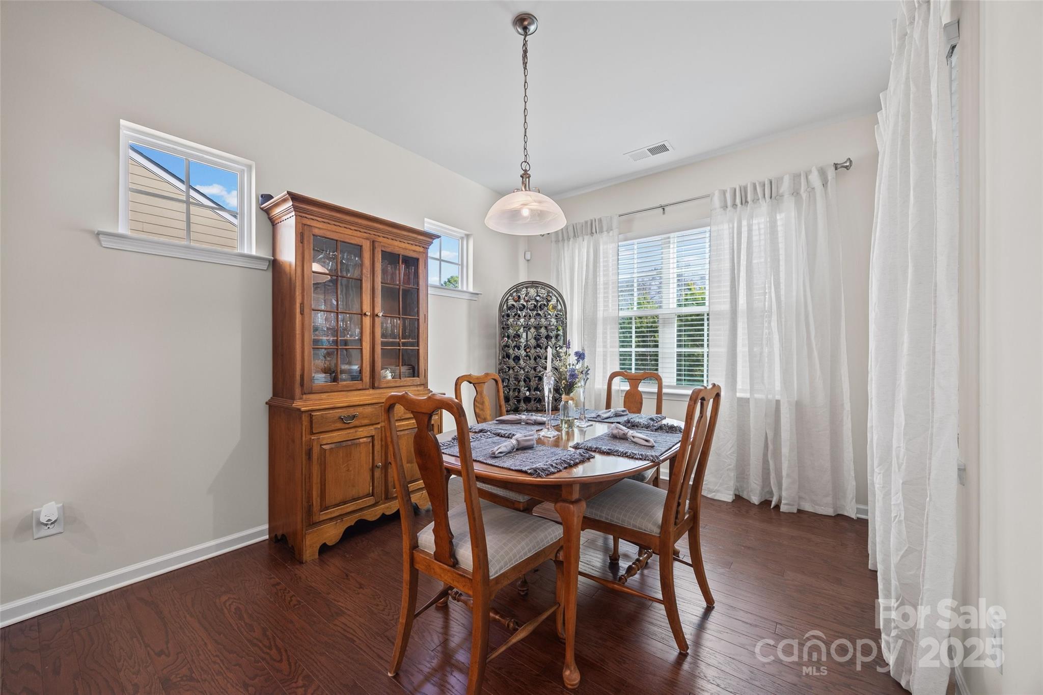 1609 Tranquility Boulevard Lancaster, SC 29720 - Photo 4 of 29 a view of a dining room with furniture window and wooden floor