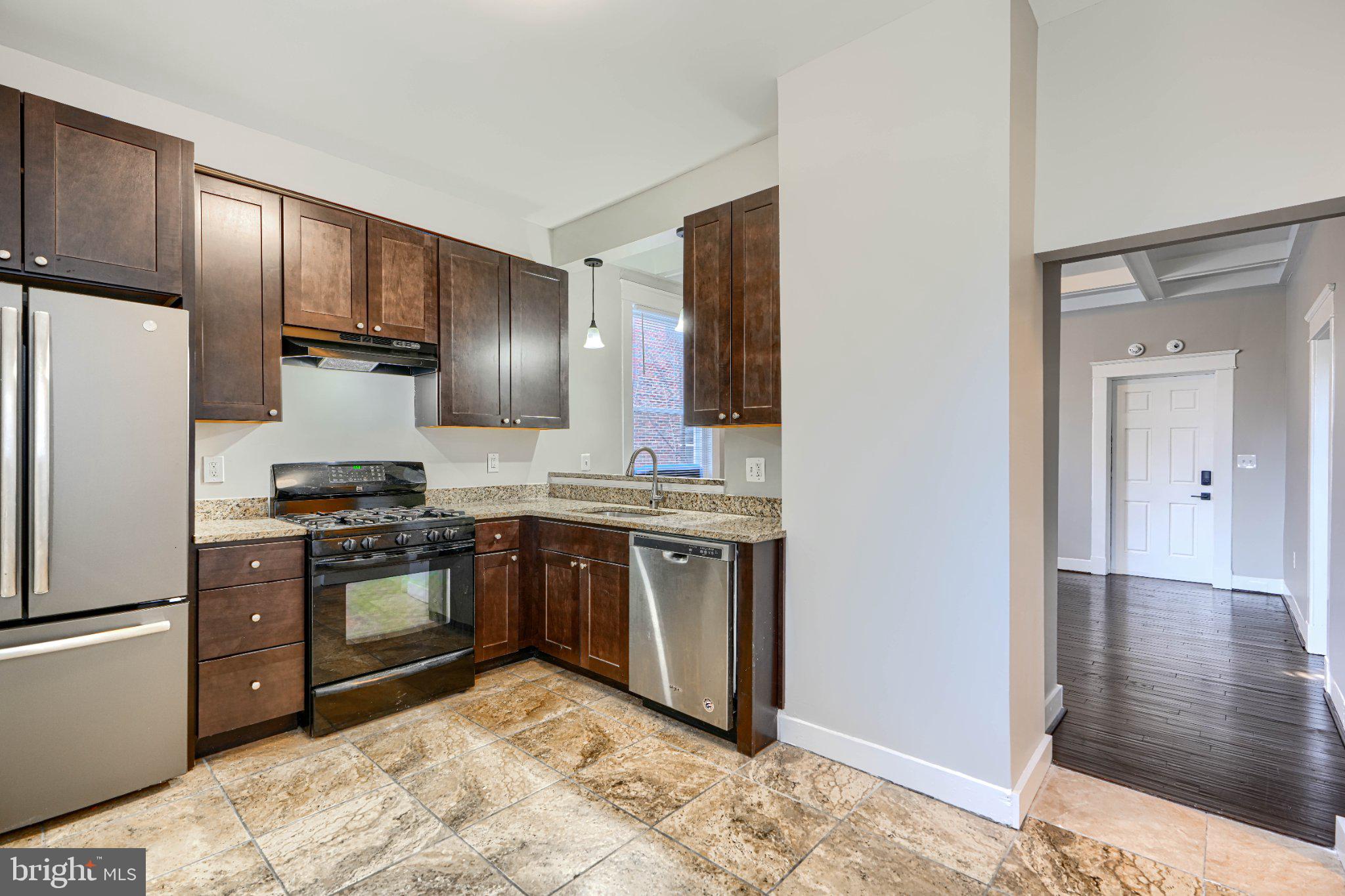 3414 Alto Road, Unit 1 Baltimore, MD 21216 - Photo 14 of 18 Modern kitchen with sleek finishes.