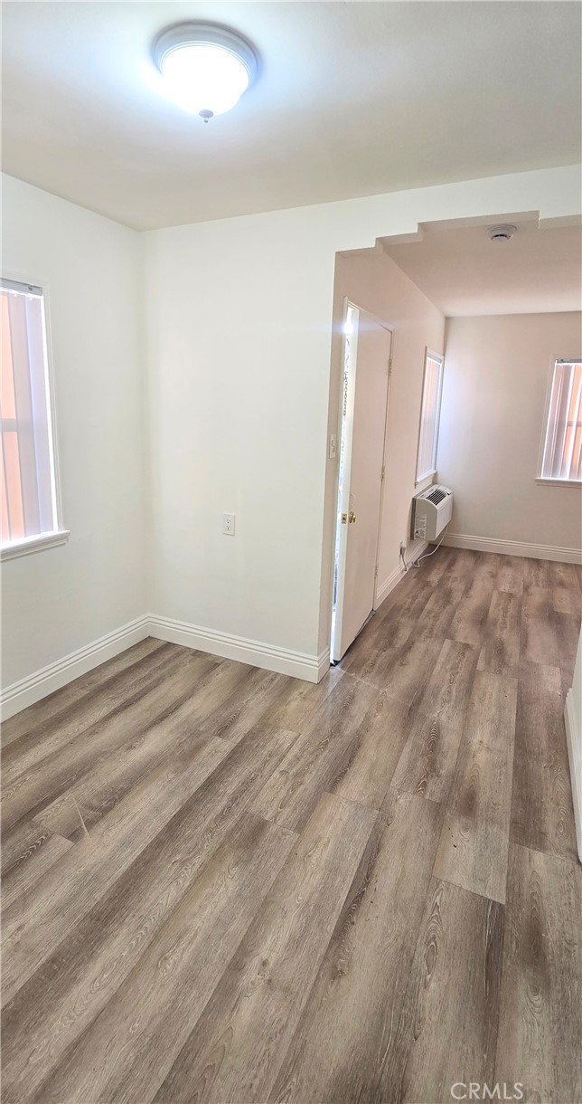 6702 Flora Avenue, Unit A Bell, CA 90201 - Photo 11 of 17 Dining area with view of front door and living room