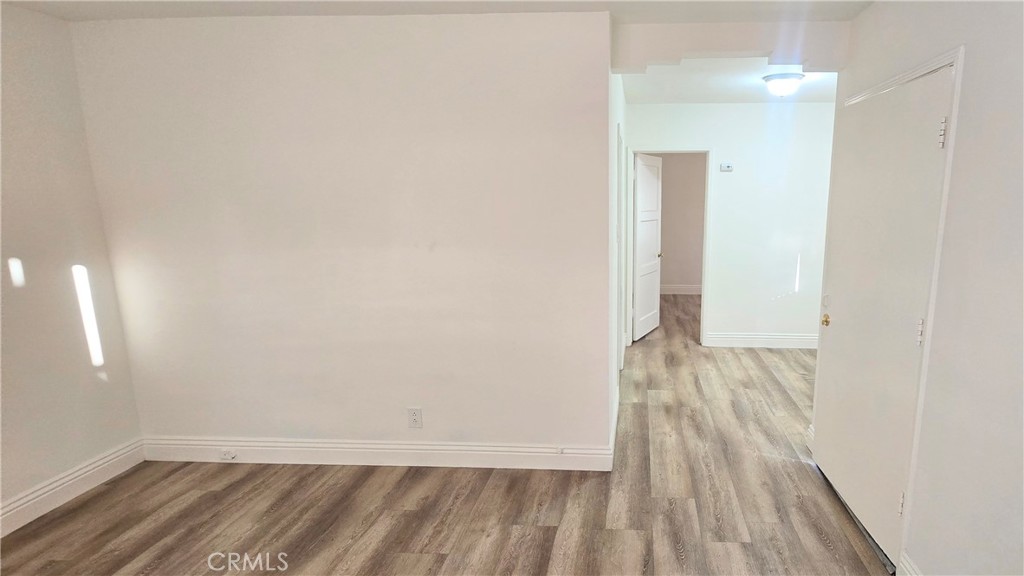6702 Flora Avenue, Unit A Bell, CA 90201 - Photo 9 of 17 Living room with view of dining area