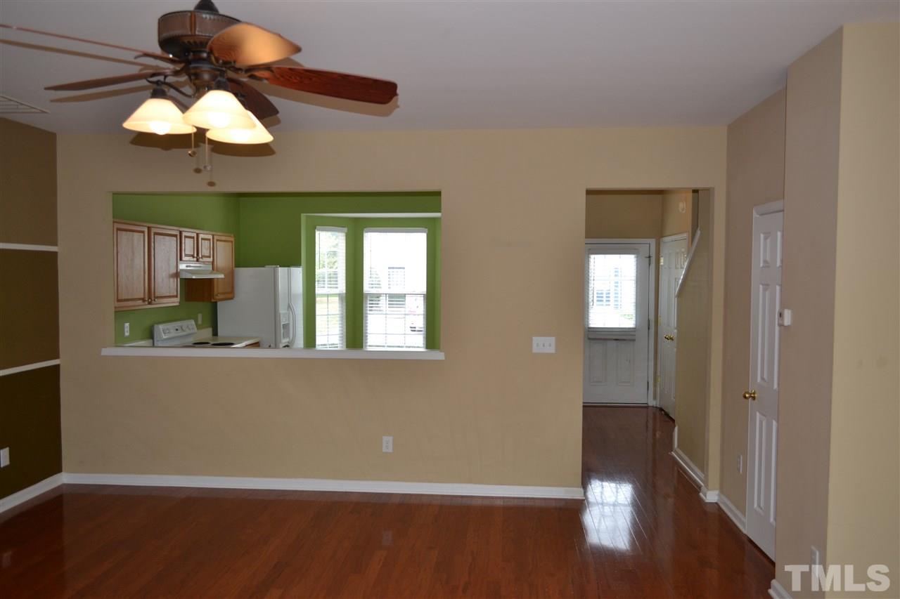 5125 Echo Ridge Road Raleigh, NC 27612 - Photo 4 of 13 a view of a livingroom with wooden floor
