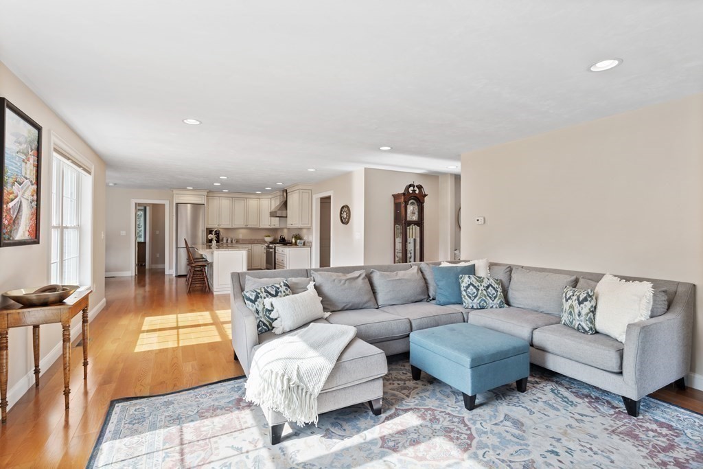 145 Old Farm Way Ayer, MA 01432 - Photo 11 of 39 a living room with furniture and a rug