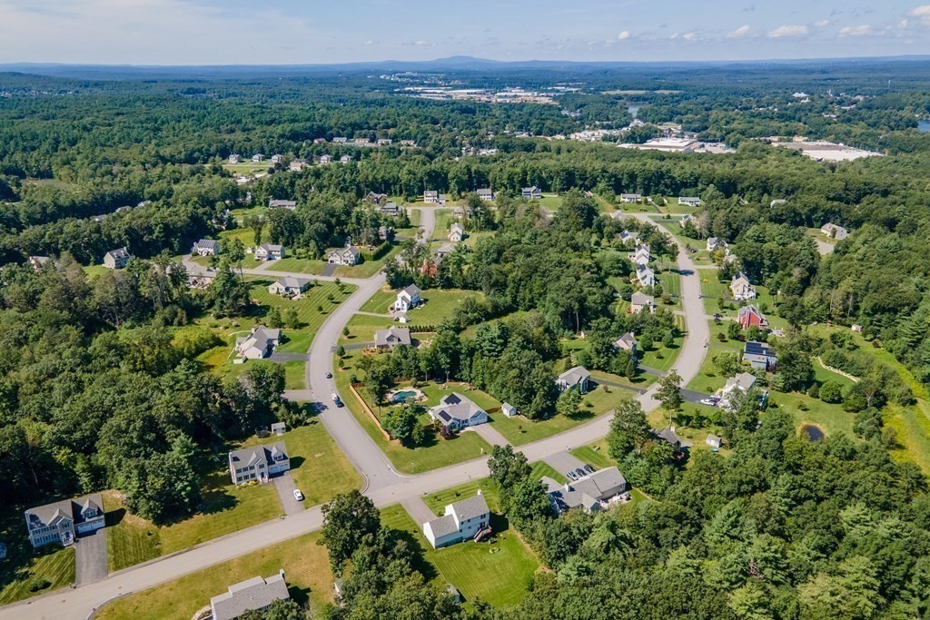 145 Old Farm Way Ayer, MA 01432 - Photo 37 of 39 an aerial view of residential house with outdoor space and trees all around