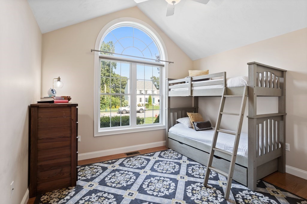 145 Old Farm Way Ayer, MA 01432 - Photo 4 of 39 a bedroom with furniture and a window