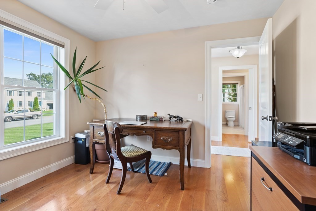 145 Old Farm Way Ayer, MA 01432 - Photo 5 of 39 a dining room with furniture and wooden floor