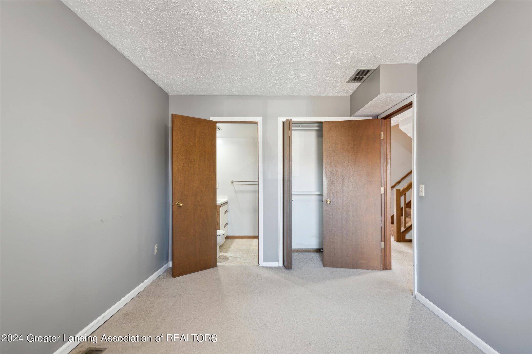 205 East Jolly Road, Unit A13 Lansing, MI 48910 - Photo 15 of 40 16-205-E-Jolly-Rd-A13-Lansing-MI-48910-W
