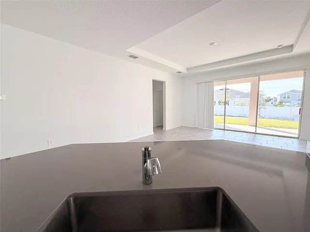 a bathroom with a sink and a window