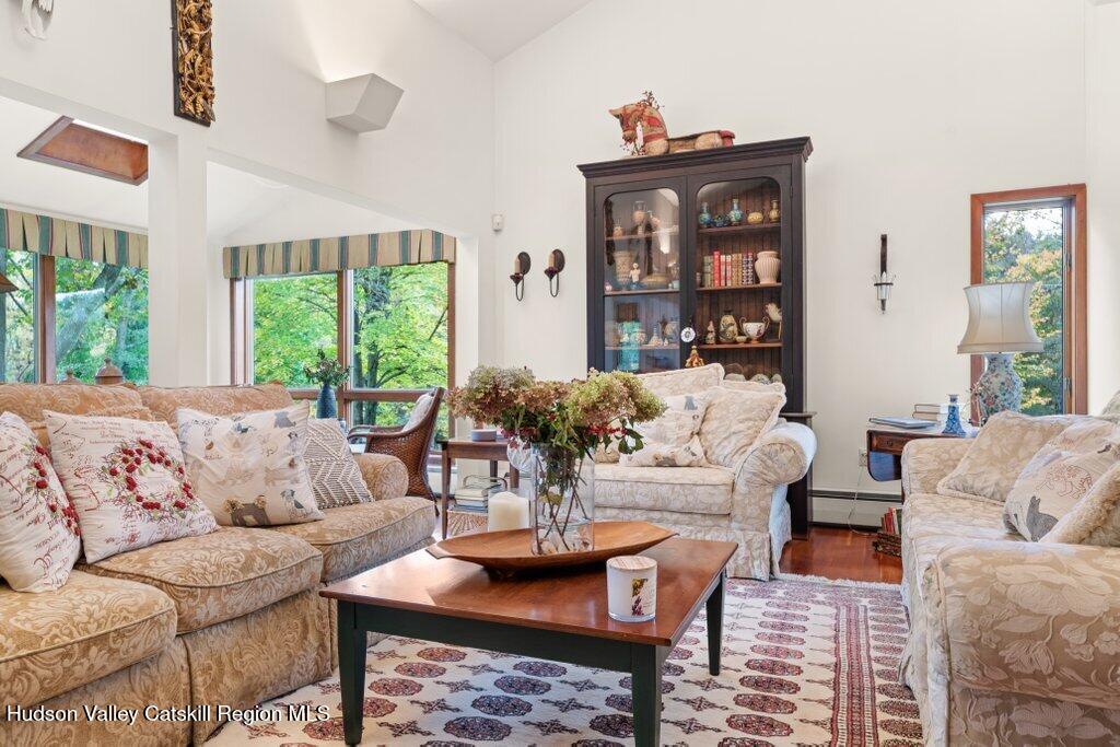 388 Sky Farm Road, Unit STOP 11 Copake, NY 12516 - Photo 20 of 57 a living room with furniture and a large window