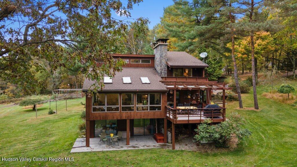 388 Sky Farm Road, Unit STOP 11 Copake, NY 12516 - Photo 3 of 57 an aerial view of a house with swimming pool garden and patio