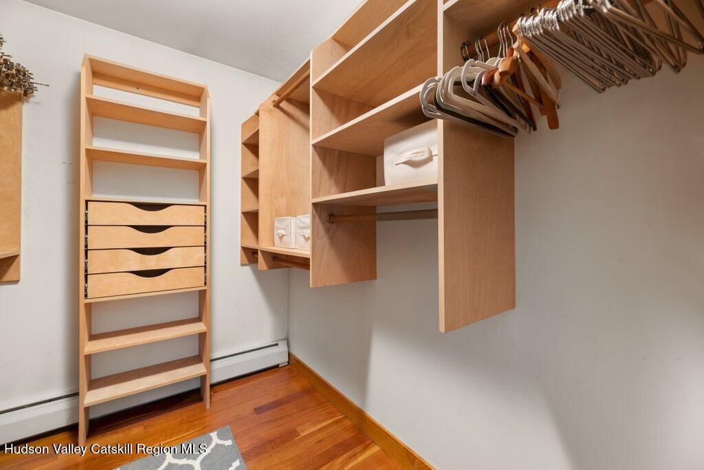 388 Sky Farm Road, Unit STOP 11 Copake, NY 12516 - Photo 35 of 57 a view of walk in closet with empty racks
