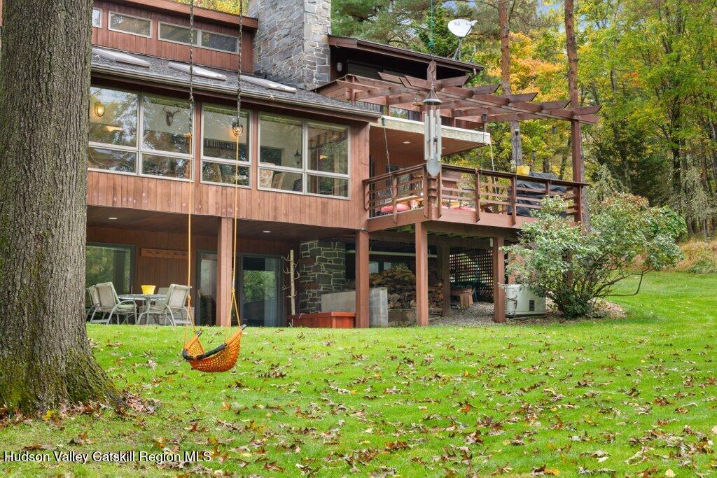 388 Sky Farm Road, Unit STOP 11 Copake, NY 12516 - Photo 46 of 57 front view of a building with a yard