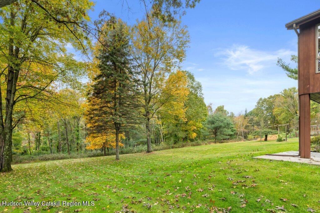 388 Sky Farm Road, Unit STOP 11 Copake, NY 12516 - Photo 47 of 57 a view of a field with trees in the background