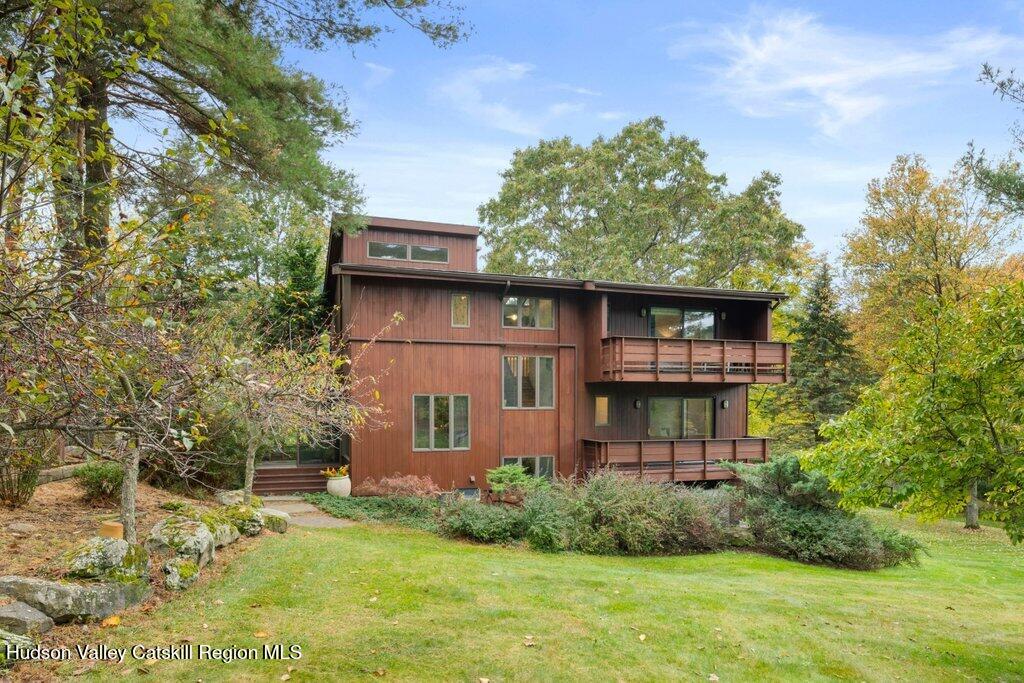 388 Sky Farm Road, Unit STOP 11 Copake, NY 12516 - Photo 51 of 57 a front view of a house with garden