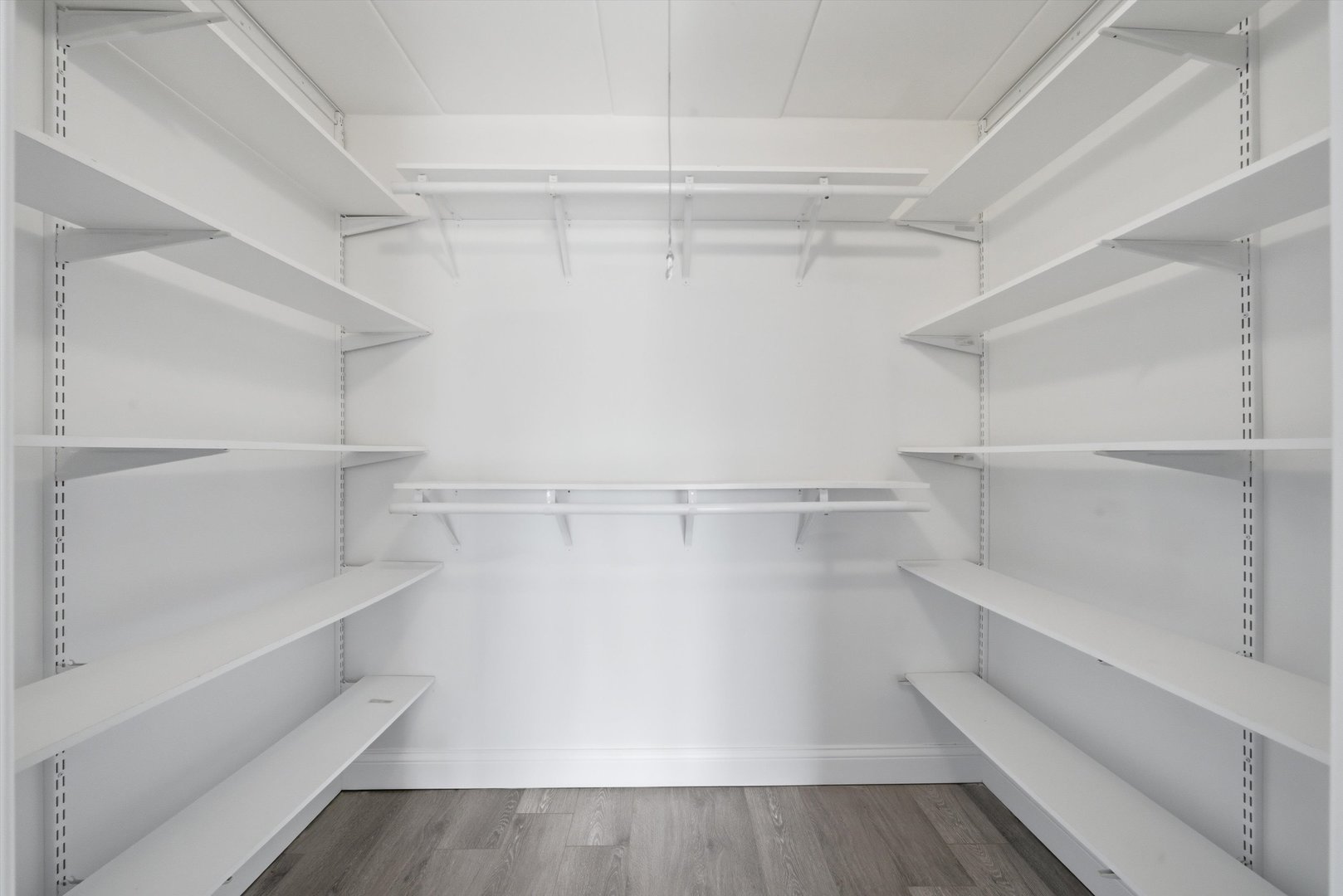 18205 Hart Drive, Unit 3A Homewood, IL 60430 - Photo 24 of 27 a view of walk in closet with empty racks