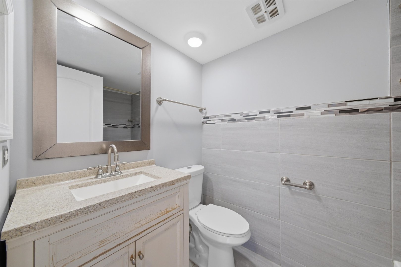 18205 Hart Drive, Unit 3A Homewood, IL 60430 - Photo 25 of 27 a bathroom with a sink toilet and shower