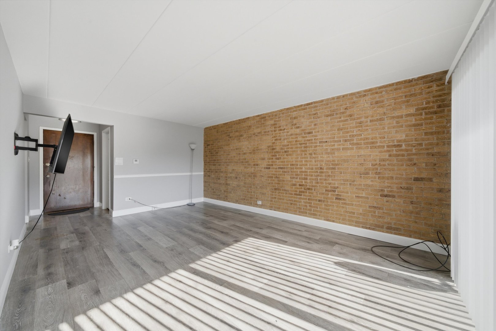 18205 Hart Drive, Unit 3A Homewood, IL 60430 - Photo 6 of 27 a view of a room with wooden floor