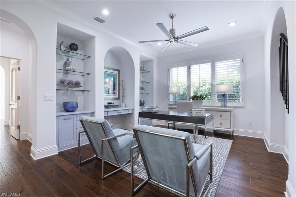16683 Lucarno Way Naples, FL 34110 - Photo 14 of 35 a view of a dining room with furniture window and wooden floor