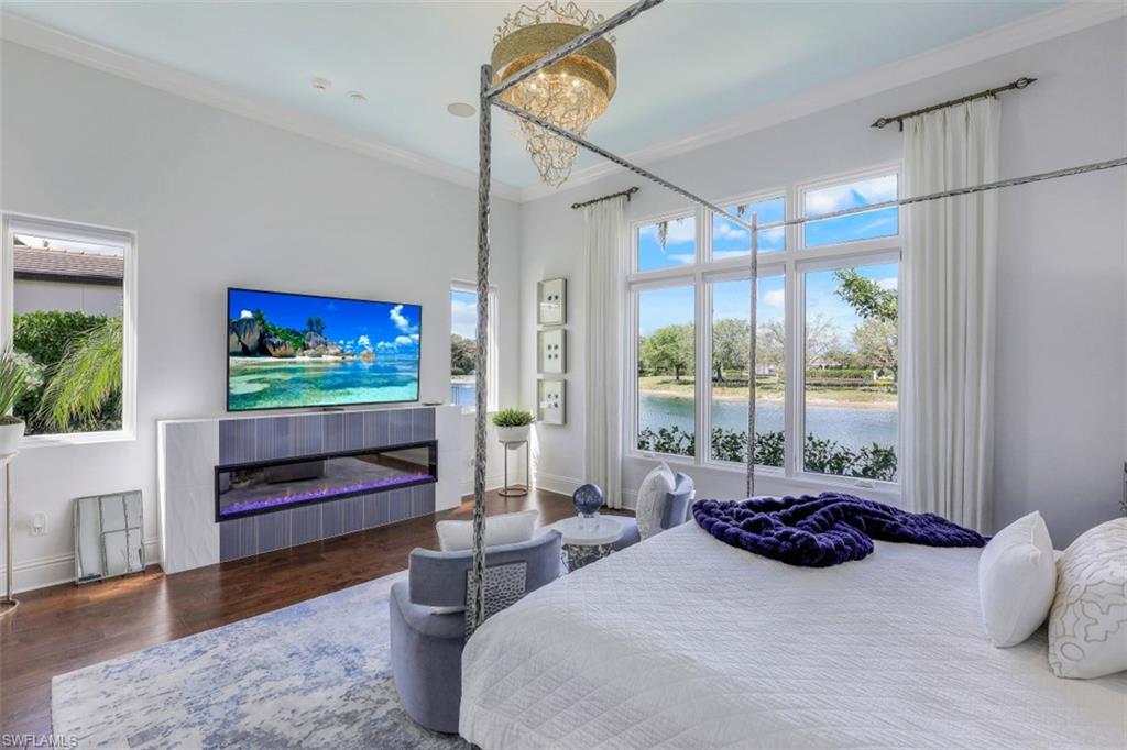 16683 Lucarno Way Naples, FL 34110 - Photo 16 of 35 a bedroom with a bed and a window