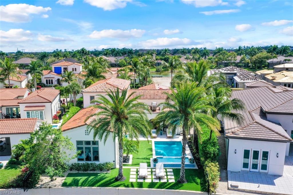 16683 Lucarno Way Naples, FL 34110 - Photo 30 of 35 a view of a city and a lot of trees
